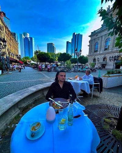 Saad Mohamed eating at a restaurant