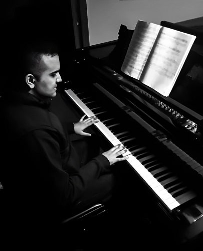 Saad Mohamed playing a piano