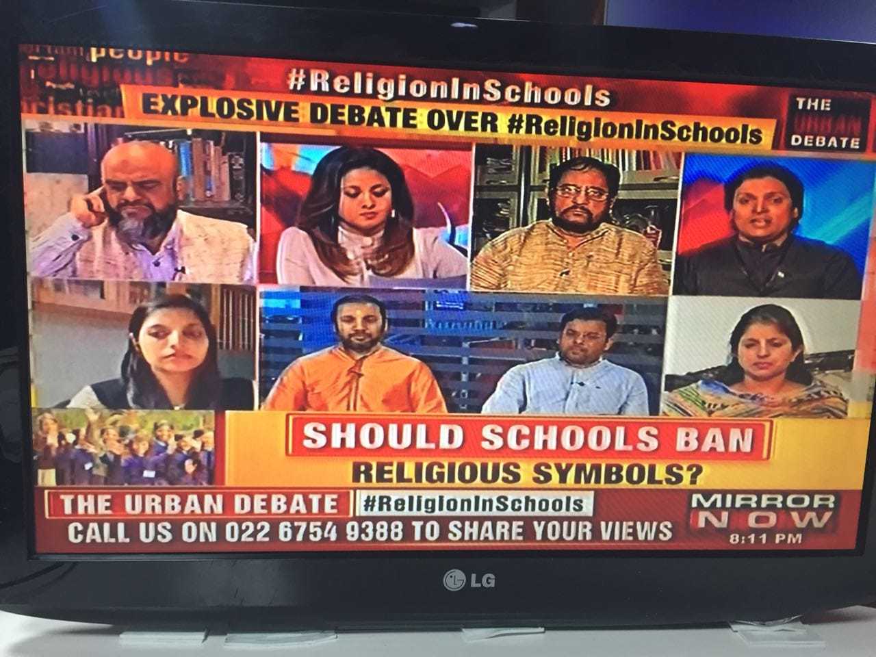 Santhi Mayadevi (extreme left, bottom row) during a TV debate