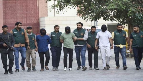 The National Investigation Agency (NIA) members escorting Shahnawaz and two other accomplices