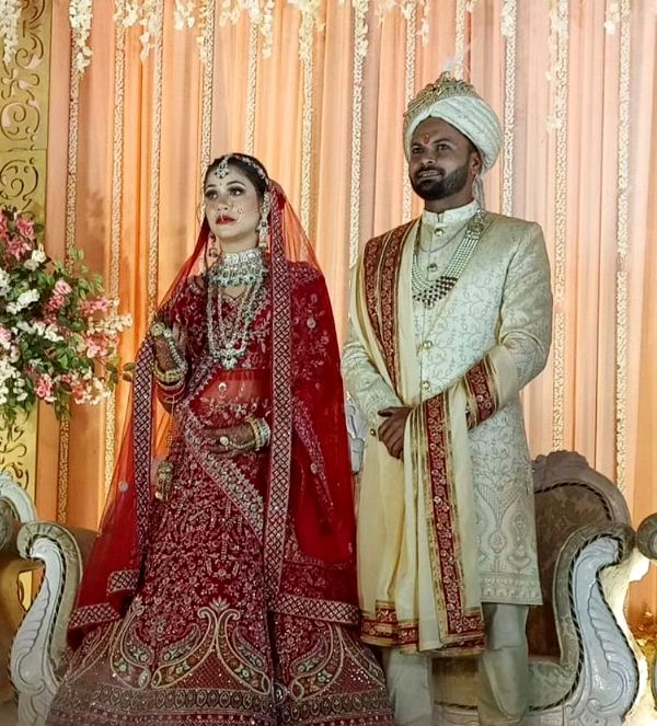 A picture of Mukesh Kumar and Divya Singh from their wedding day