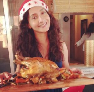 Auritra Ghosh eating chicken
