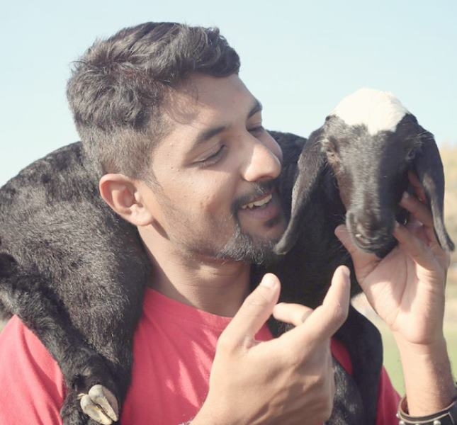 Avinash Surasundra with a goat