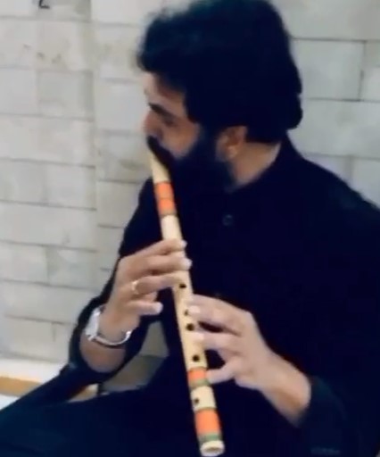 Heramb Tripathi while playing flute
