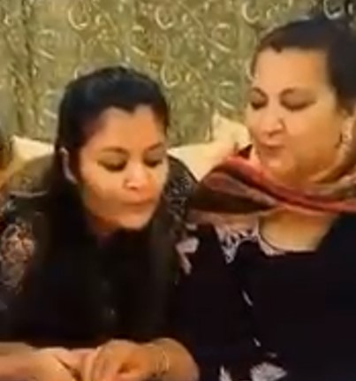 Jasmine Kaur posing with her mother
