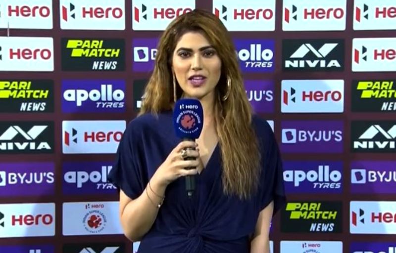 Neha Anand as a sports presenter at an Indian Super League (ISL) event