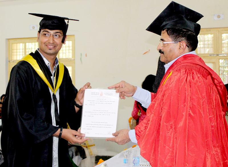 Ravi Gupta (left) during his convocation after completing his graduation