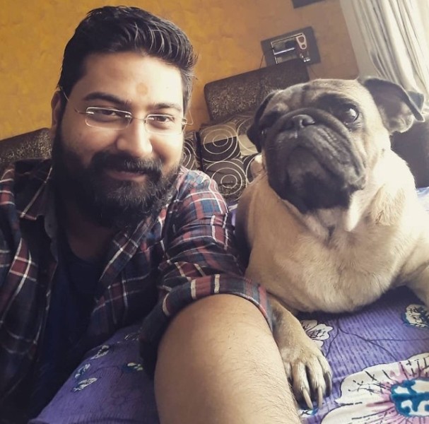 Ravi Gupta with his pet dog