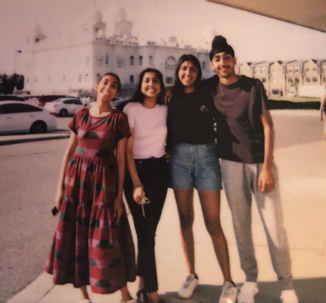 Rupi Kaur with her siblings