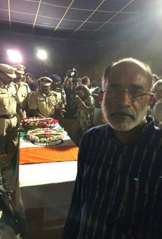 Alphons Kannanthanam's picture in front of the coffins of Jawans after the 2019 Pulwama attack