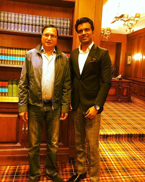 A photo of Abhishek Singh with Rajat Sharma