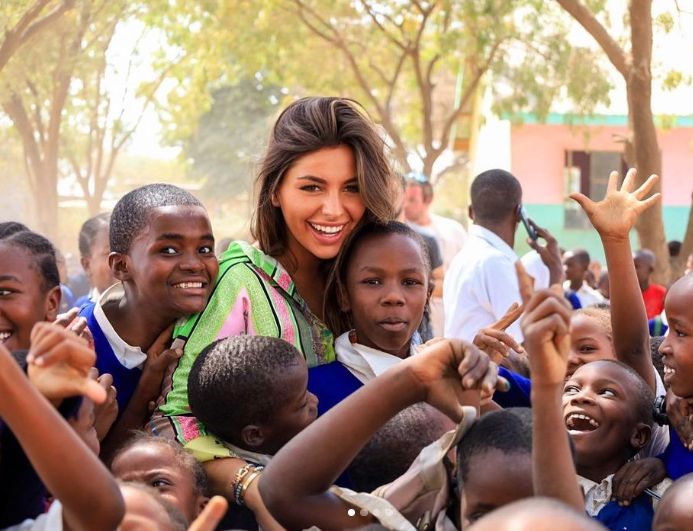 Cécile Wolfrom with underprivileged kids
