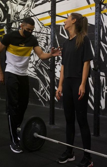 Cécile Wolfrom working out with her trainer