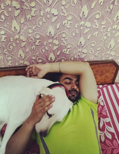 Gagan Singh with a dog