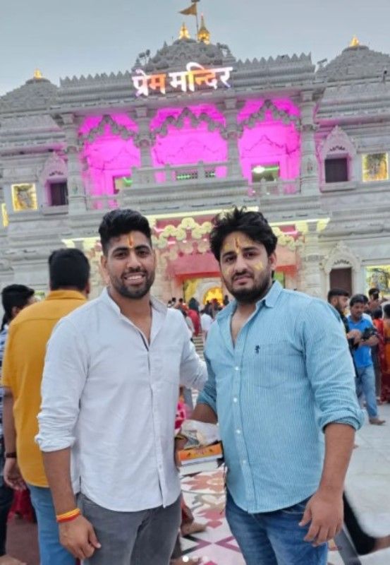 Neeraj Kumar (left) at the Prem Mandir, Vrindavan