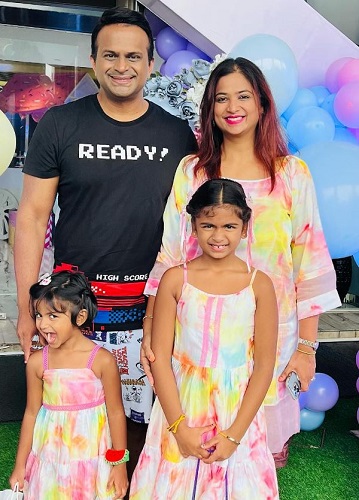 A picture of Siddharth Kannan with his wife and daughters