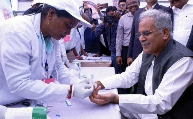 Bhupesh getting his blood checked after inaugurating the Malaria Mukt Bastar Scheme