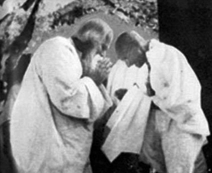 Rabindranath Tagore and Mahatma Gandhi greeting each other