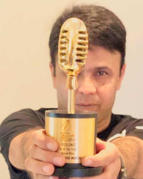 RJ Naved with the 2019 Golden Mikes Award