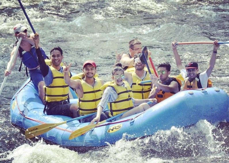 Monank Patel (third from right) doing rafting