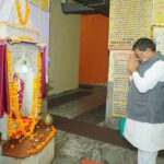 Rajendra Yadav praying