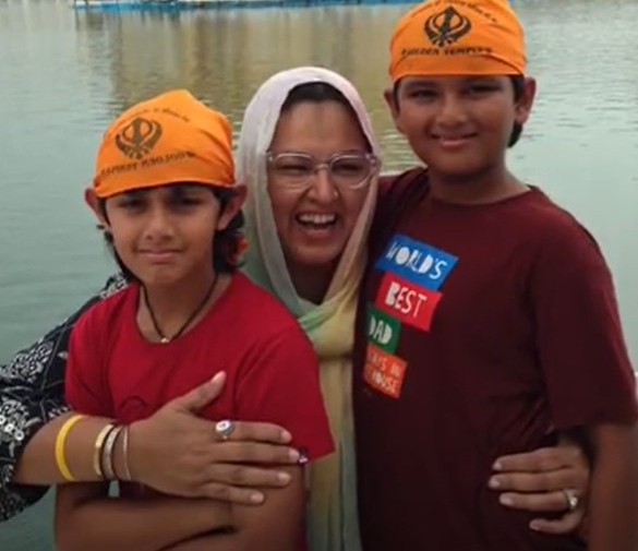 Angkrish Raghuvanshi (right) with his mother and younger brother