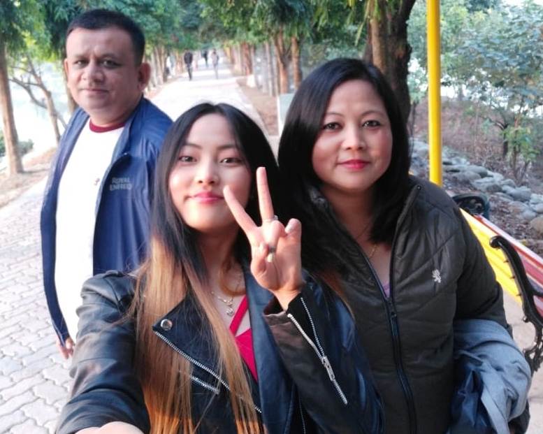 Deekila Sherpa with her parents