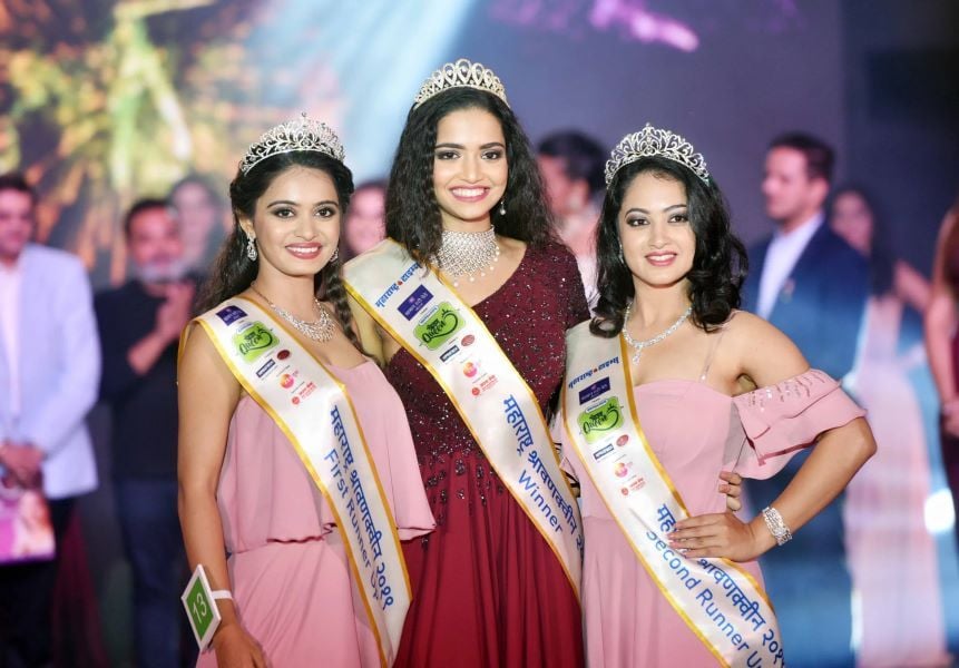 Pooja Katurde (left) posing as the first runner up of MT Shravan Queen contest