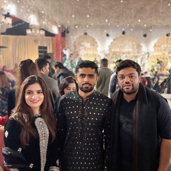 Ducky Bhai and his wife posing with the captain of Pakistani cricket team Babar Azam