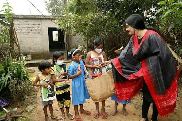 Varsha Priyadarshini distributing stationary to the underprivileged Childrens on behalf of Sammanita institution at Cuttack