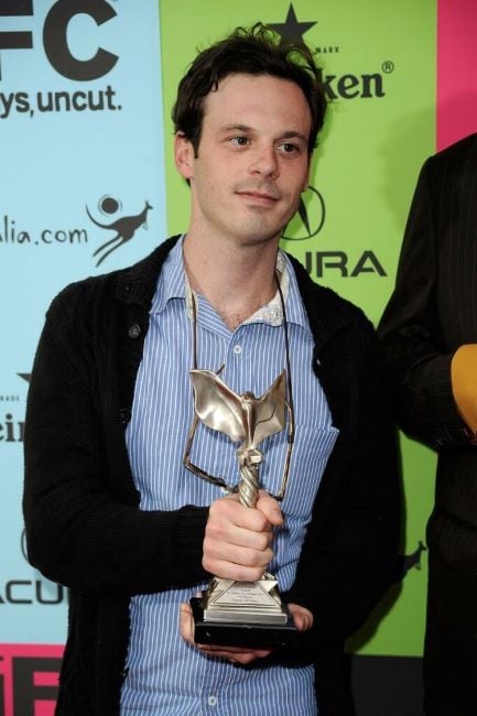 Scoot McNairy holding Independent Spirit Award (2009)