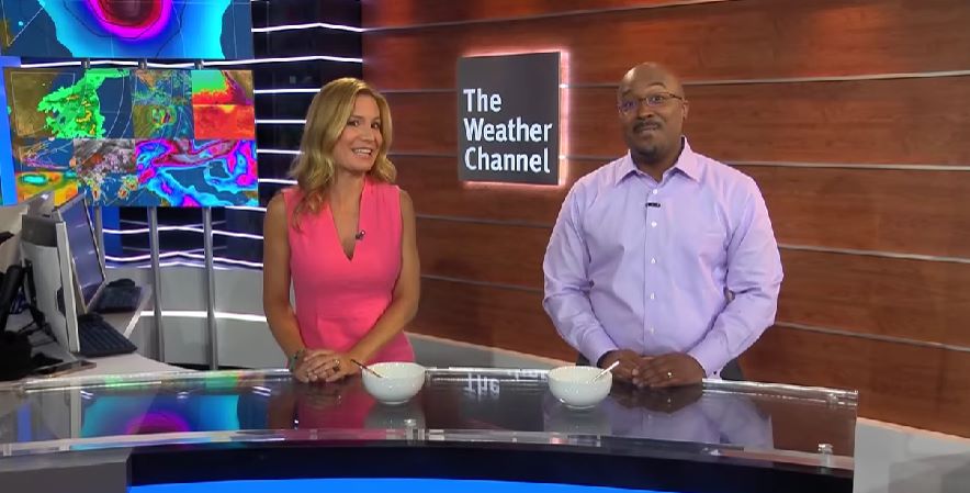 Jen Carfagno and Alex Wallace hosting the news show on The Weather Channel