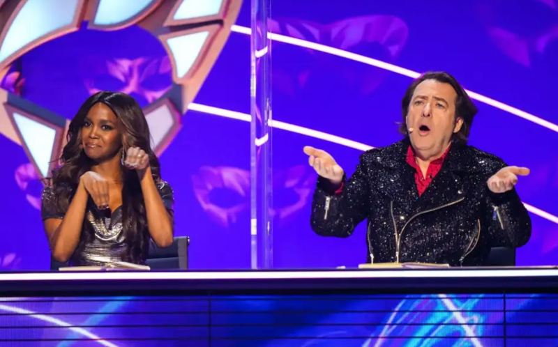 Oti Mabuse and film critic Jonathan Ross as panellists on the reality show 'The Masked Dancer'