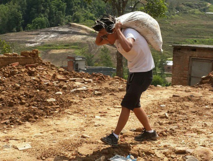 Sudan Gurung during a relief initiative during 2015 Nepal earthquake