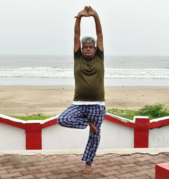 Heera Lal Patel while practising yoga