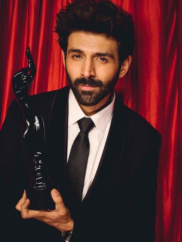 Kartik Aaryan, after winning an award at the 70th Filmfare Awards