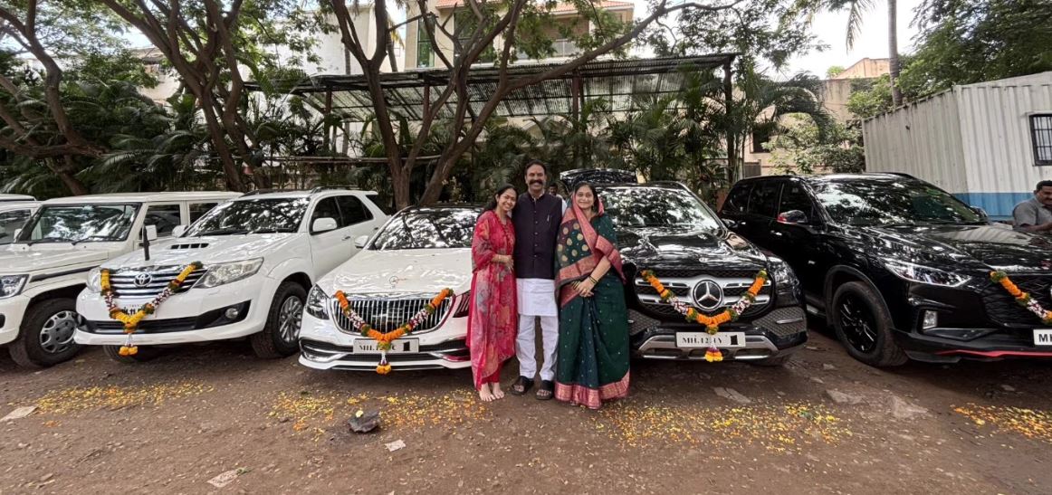 Ranjitsinh Naik Nimbalkar and his family, while posing with their cars