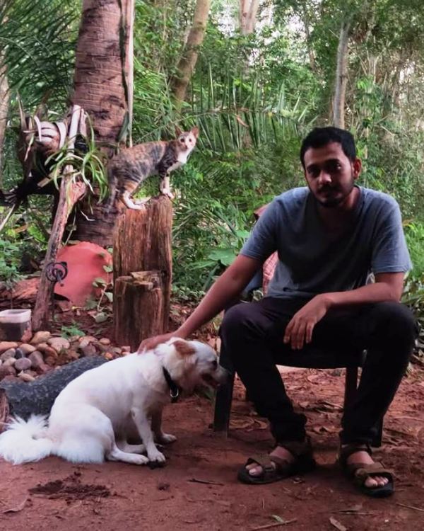 Chidambaram S. Poduval with a dog