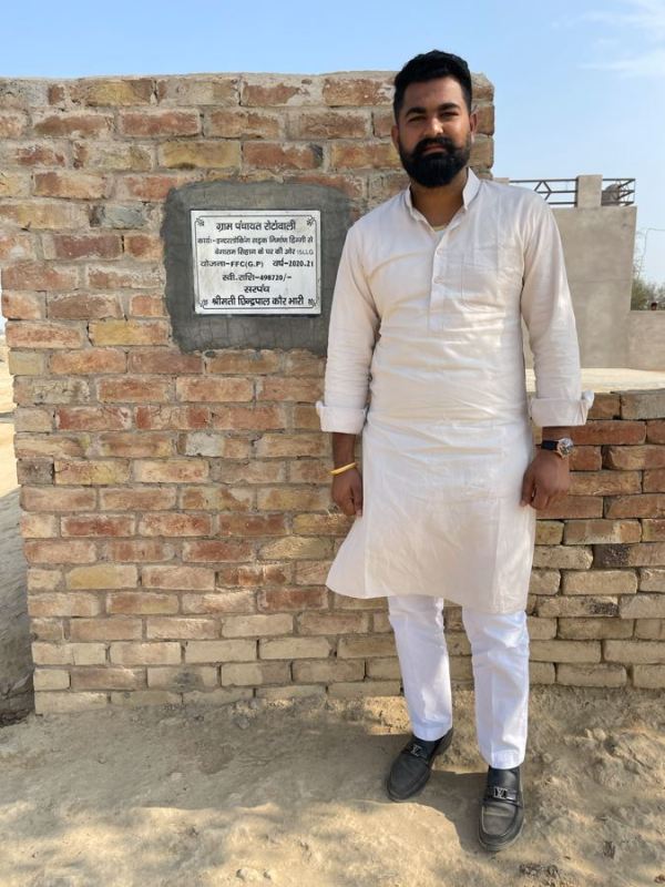 Gurjinder Singh Gavy, standing at the site of a rural development project completed under the Rottan Wali Gram Panchayat initiative