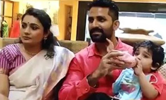 Meera Vasudevan with her second husband, John Kokken and son