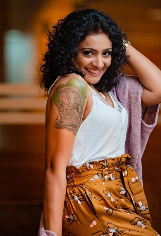 Meera Vasudevan's arm tattoo