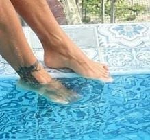 Tattoo on right ankle of Diana Areas