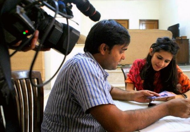 An old picture of Runjhun Sharma while working as a news reporter