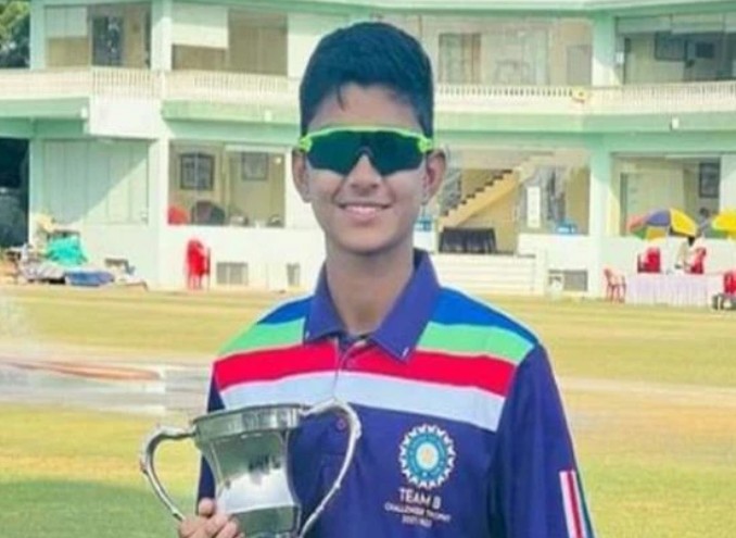 Anushka Brijmohan Sharma posing with a trophy