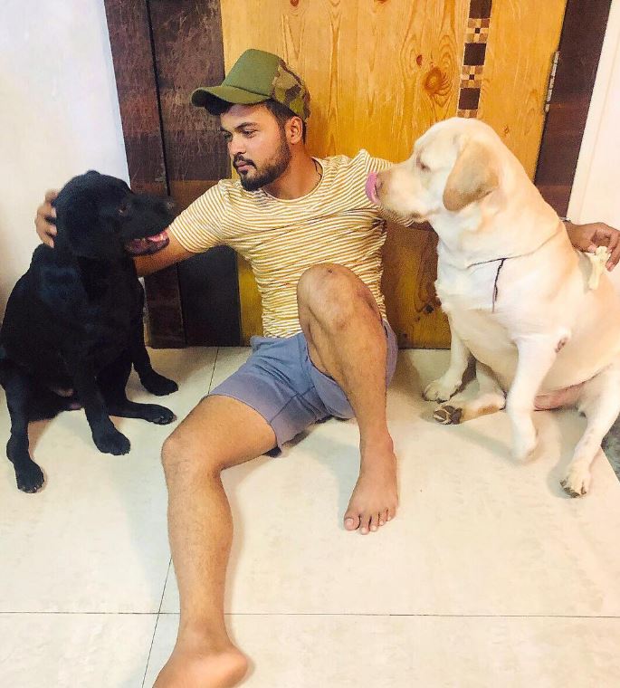 Hardik Tamore with his dogs