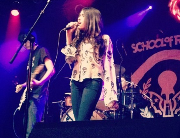Madison Beer while singing live in 2012