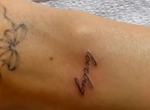 Madison Beer's 'Lovebug' tattoo on her right wrist