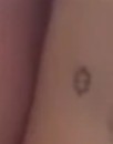 Madison Beer's a small puzzle piece tattoo on the inner side of her left foot