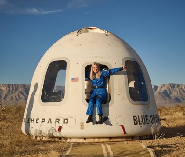 Michaela Benthaus posing in the New Shepard rocket