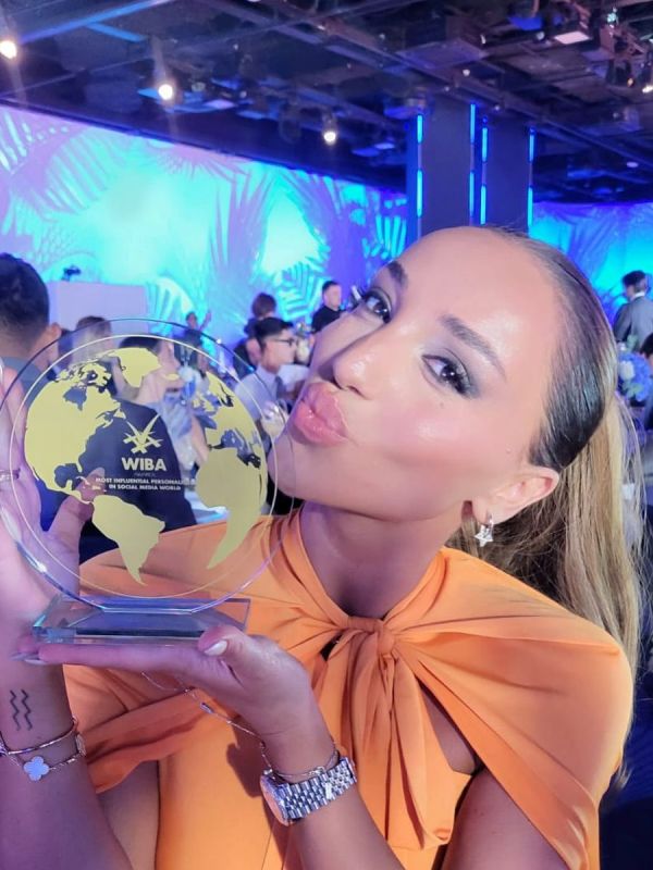 Nutsa Buzaladze with the Music Influencer of the Year award, which she won at the WIBA Awards Gala Ceremony